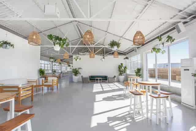 Modern reception area at The Terrace Rooftop with natural light, ideal for events.