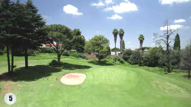 Patio at Observatory Golf Club, lush greens perfect for corporate retreats or networking events.