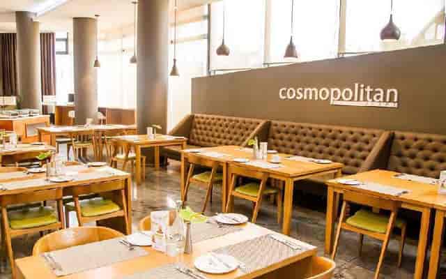 Modern dining space in Cosmopolitan Restaurant, perfect for networking lunches and events.