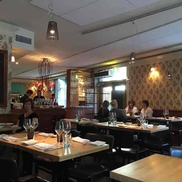 Cozy restaurant terrace in Ravintola Kuu for intimate meetings and private events.