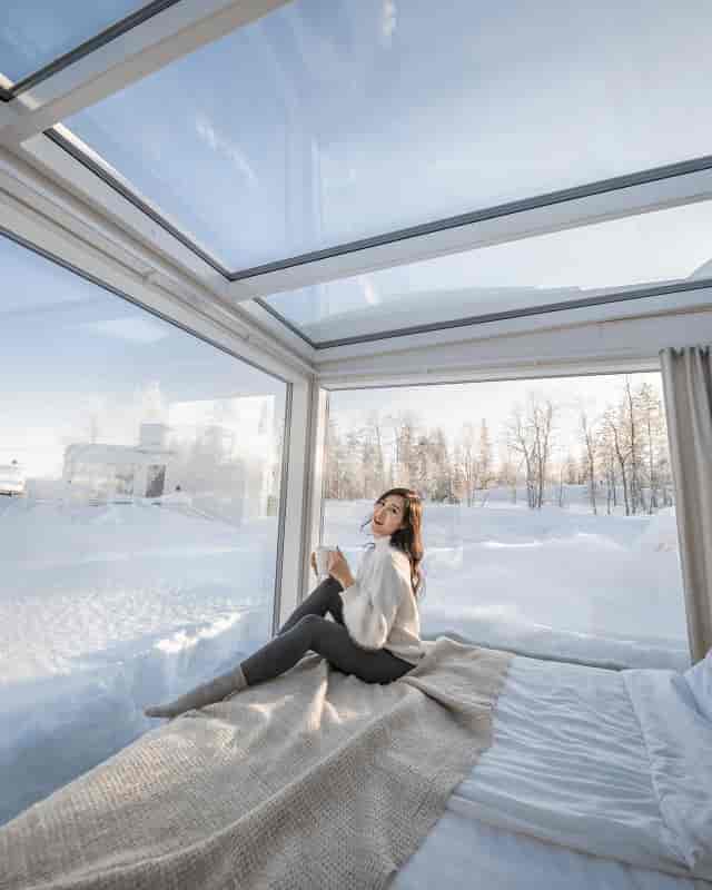 Sky View Cabin with large windows, perfect for winter retreats and intimate gatherings.