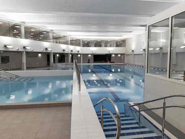 Modern indoor swimming pool in Kallio, perfect for wellness retreats and team-building events.