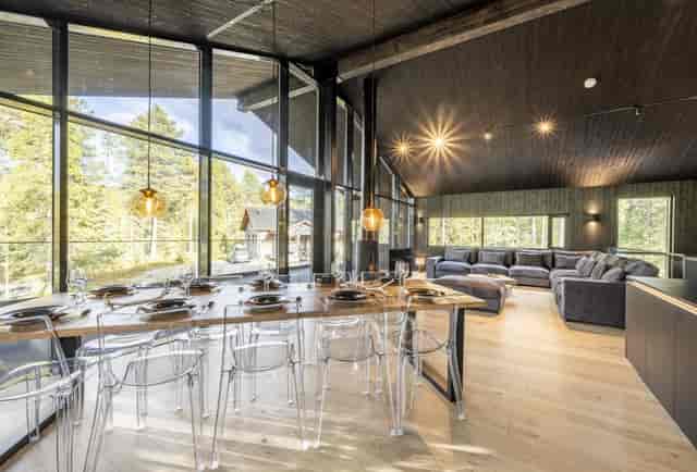 Villa Welhonranta event space with large windows, perfect for intimate gatherings and workshops.
