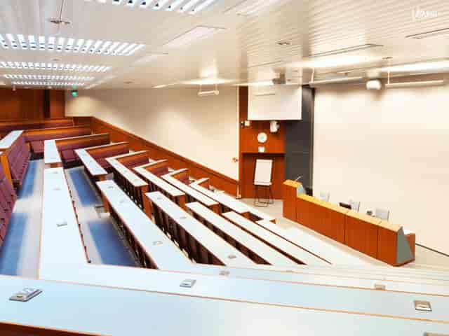 Modern auditorium with tiered seating for events in Hotel Haaga Central Park.
