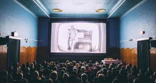 Engaged audience in vintage cinema at The Labia Theatre, perfect for events and film screenings.