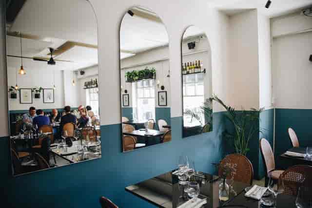 Inviting dining space with modern decor for networking dinners and receptions.