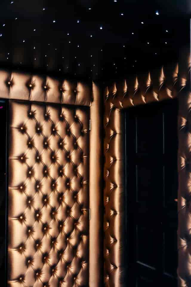 Luxurious tufted wall at Saint Champagne Bar & Lounge for high-end events.