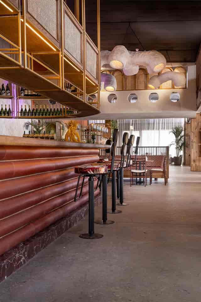 Stylish wooden bar at Cabo Beach Club, perfect for networking and receptions.