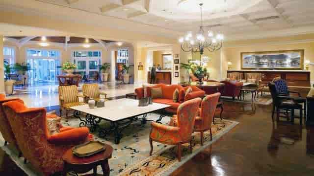 Sophisticated Pre-function area with plush seating for networking events at The Table Bay.