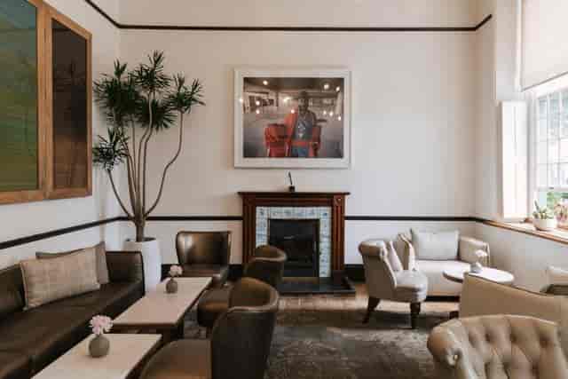 Stylish lounge area in Alphen Boutique Hotel, ideal for networking events and meetings.