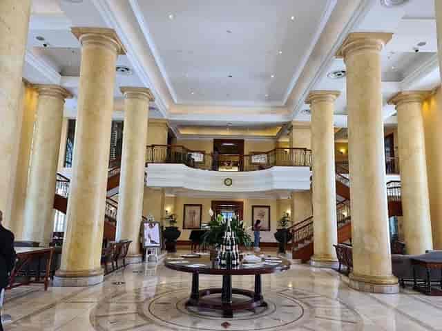 Elegant Cullinan lobby with grand pillars, perfect for events and meetings.