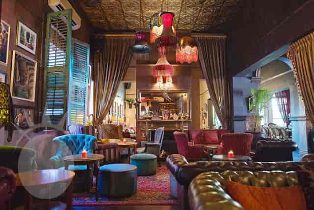 Stylish garden event space with vibrant decor for intimate gatherings and networking.