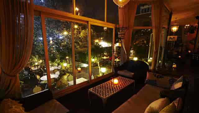 Library lounge at Kloof Street House, cozy ambiance for cocktail receptions and networking.