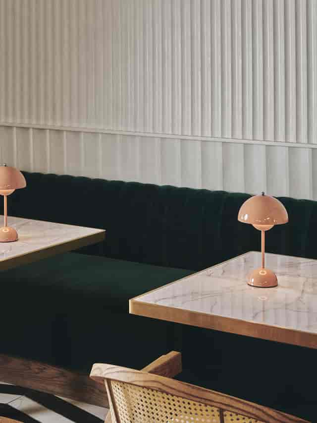 Elegant meeting space with plush seating and warm lighting for creative gatherings.