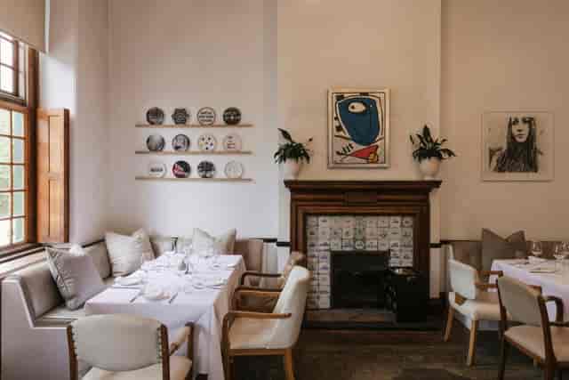 Elegant conference room at The Alphen for intimate meetings and private dinners.