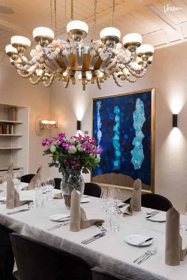 Elegant chandelier in Dining Room Elias, Hotel St. George for upscale events and celebrations.