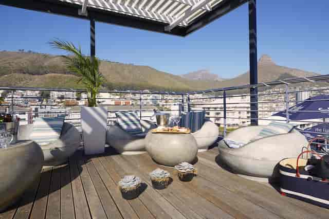 Stylish rooftop terrace at The Hyde Hotel, perfect for networking events and receptions.