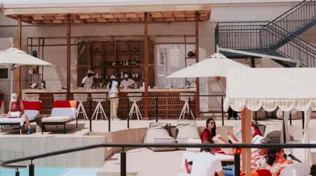Stylish outdoor pool bar at Cape Grace, perfect for luxury events and social gatherings.