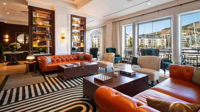 Library Lounge at Cape Grace Hotel: plush seating, inviting atmosphere for networking events.