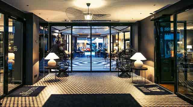 Stylish hotel entrance with modern elegance, perfect for meetings and social events