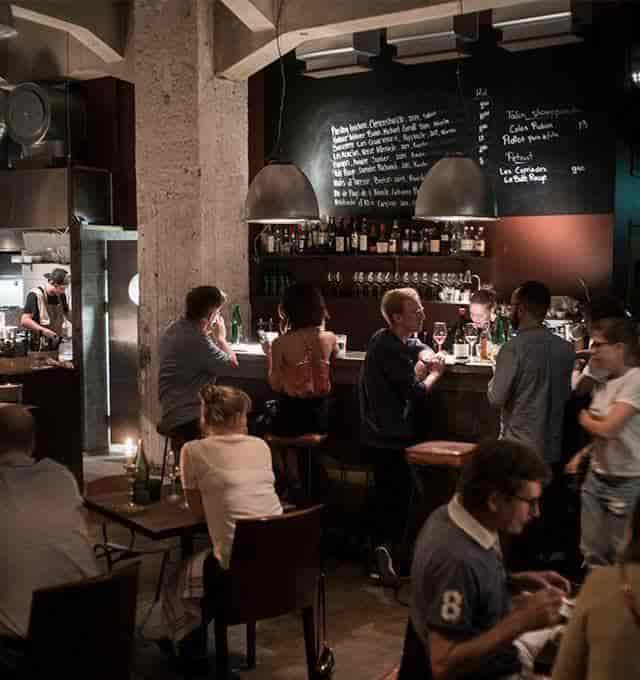 Vibrant bistro venue with cozy seating, perfect for informal meetings and events.