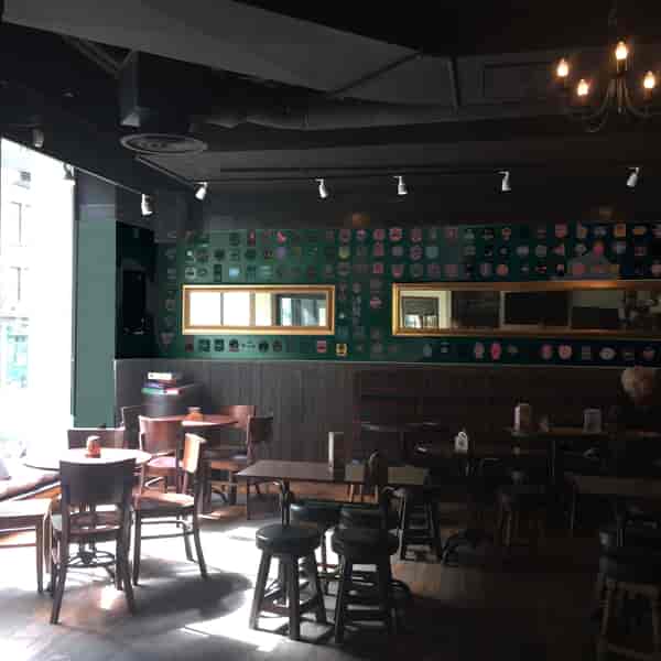 Cozy Blackdoor bar with warm lighting, perfect for meetings and networking events.