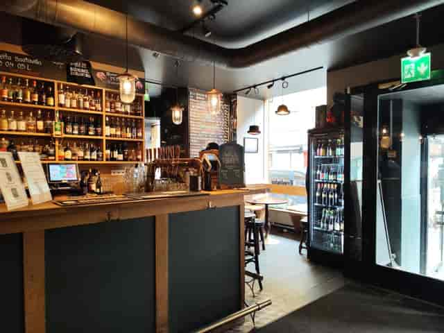 Cozy bar in Blackdoor with rustic decor, ideal for casual events and networking.