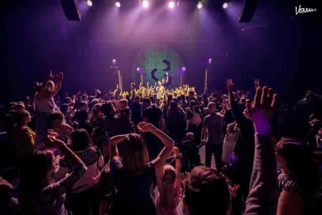 Vibrant crowd at Black Box, Musiikkitalo; energetic event highlighting audience engagement.