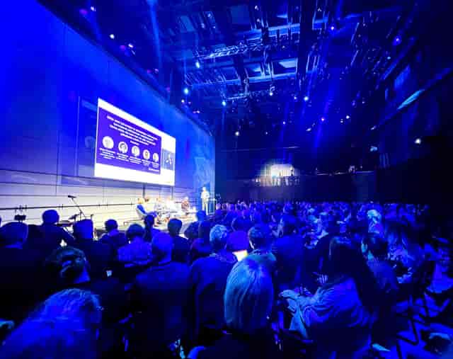 Paavo at Musiikkitalo during a dynamic panel discussion event with engaged audience.