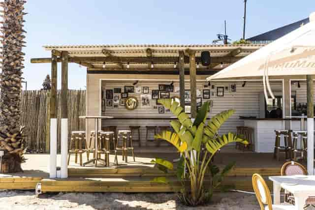 Stylish outdoor bar at Grand Africa Café, perfect for casual gatherings and social events.