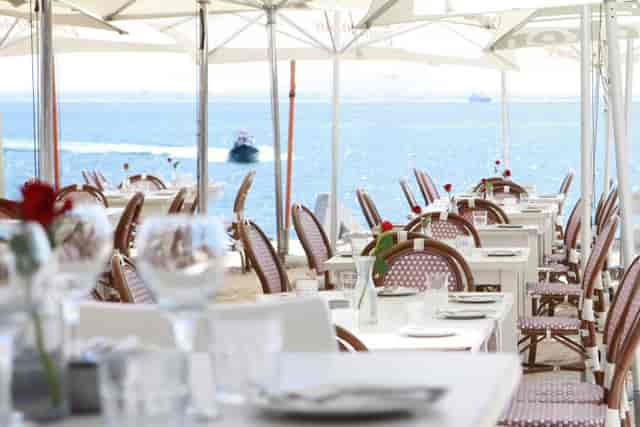 Outdoor dining at Grand Africa Café with ocean view, ideal for upscale events.