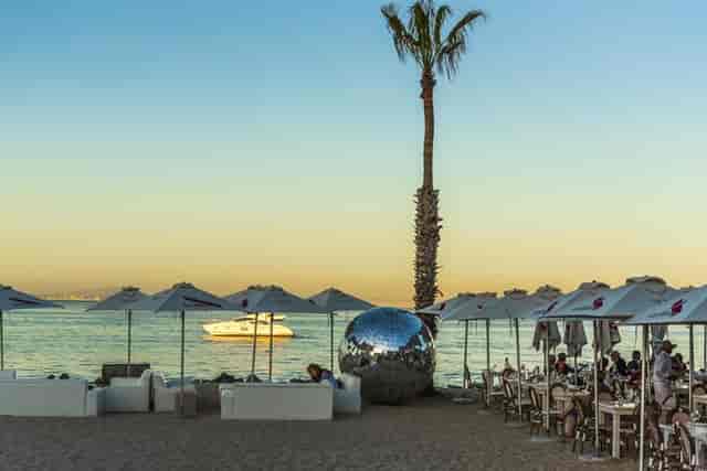 Ocean-view decks at Grand Africa Café, ideal for upscale corporate retreats and events.