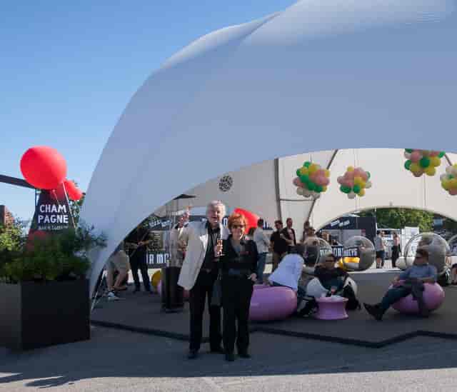 Eero Aarnio Originals event: stylish tent, balloons, networking at Helsinki Design Week.