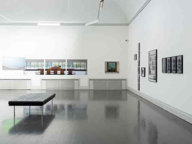 Modern art exhibition gallery in Kunsthalle Helsinki with polished flooring.