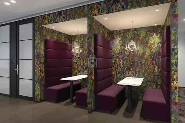 Stylish breakout area with plush seating, ideal for creative meetings and discussions.