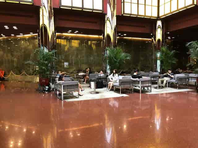 Spacious Lobby Lounge at The Great Wall Hotel Beijing, perfect for networking events.