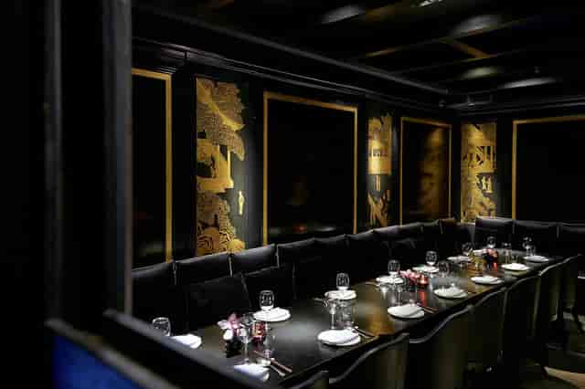 Elegant dining area at Hakkasan for exclusive meetings and private events.