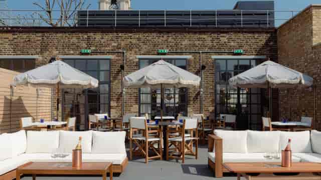 Stylish Hakkasan rooftop terrace with elegant seating for outdoor events and gatherings.