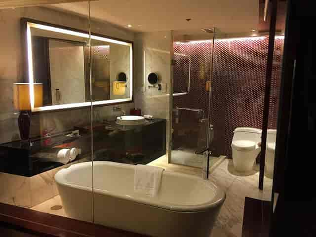 Elegant bathroom with dual sinks, ideal for VIP meetings in Renaissance Beijing Hotel.