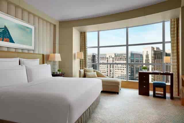 Luxurious hotel room in Ritz-Carlton Beijing, ideal for business meetings and events.