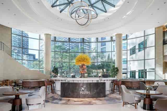 Ornate meeting suite in Westin Beijing, elegant decor with floral arrangement, ideal for events.