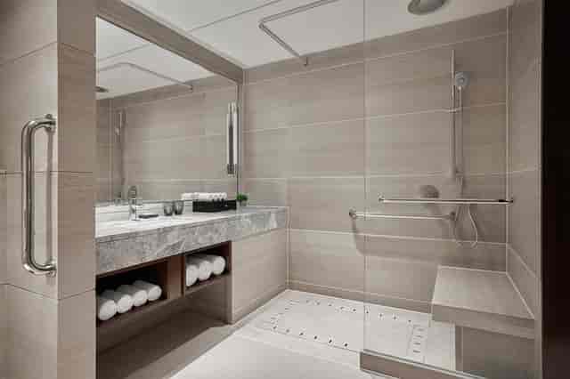 Accessible modern bathroom at JW Marriott Hotel Beijing Central for events and comfort.