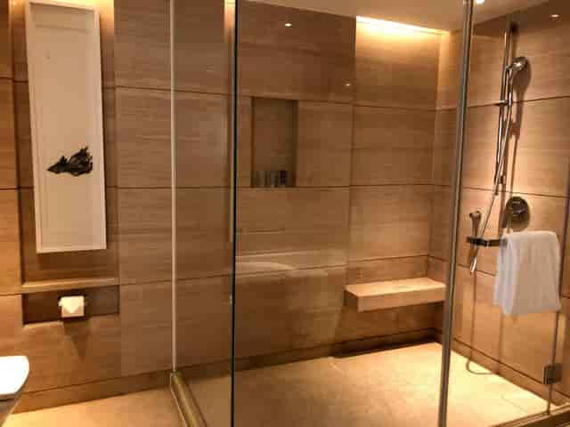 Modern luxury shower space in JW Marriott Hotel Beijing Central, ideal for high-end retreats.