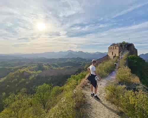 Hiking area in Beijing Zoo with Great Wall backdrop, perfect for team-building events.
