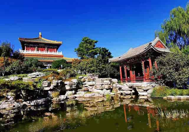 Main Exhibition Area at Beijing Garden Expo Park with lush greenery, ideal for outdoor events.