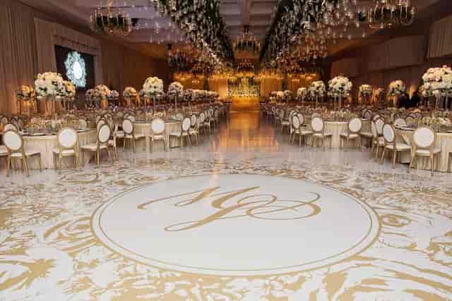 Eternity event space with elegant floral arrangements, ideal for weddings and formal gatherings.