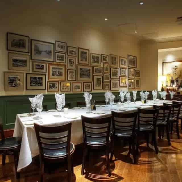 Elegant dining setup in Green Room, ideal for corporate events and private dinners.