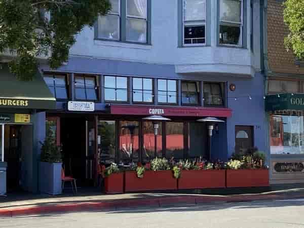 Cozy rooftop trellis at Copita Tequileria for casual gatherings and networking events.