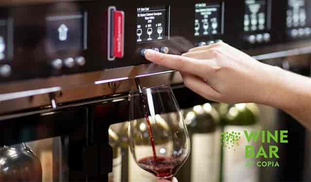 Modern wine dispensing system at Culinary Institute for upscale events & tastings.