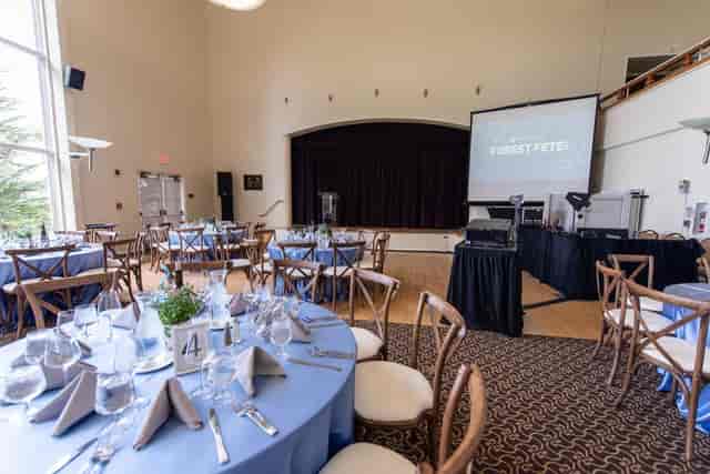 Elegant Ventana Room setup with blue linens for formal events and meetings.